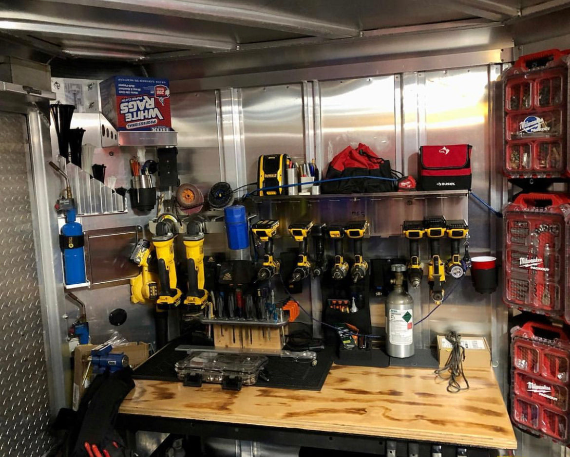 Power tool and battery storage outlet